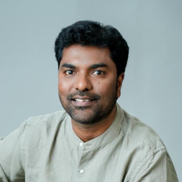 Portrait of Suresh Katta, Founder & Managing Director